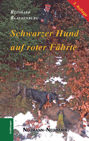 Schwarzer Hund auf roter Fährte